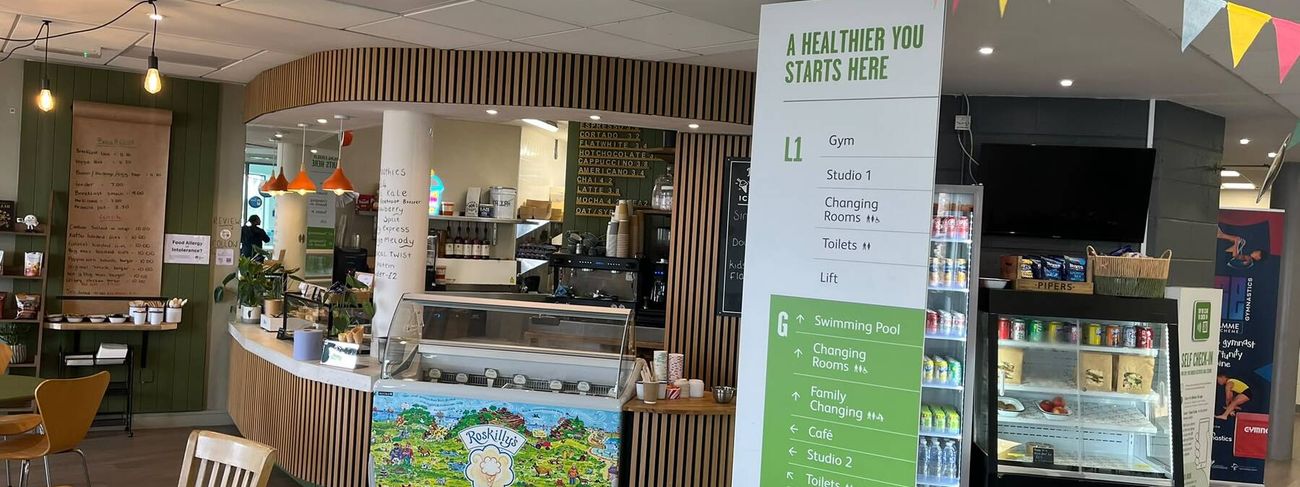 Feed Cafe counter with timber slats and green panelling